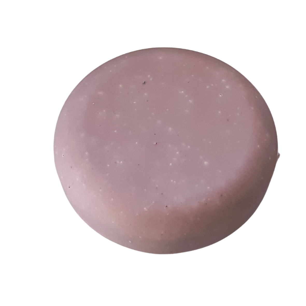 Image shows Evee Ivy Oh's Almond Milk and Pink Clay soap.  Our milk bars are round, flat and pebble-like. This image shows the delicate pink colouring from the Australian pink clay.