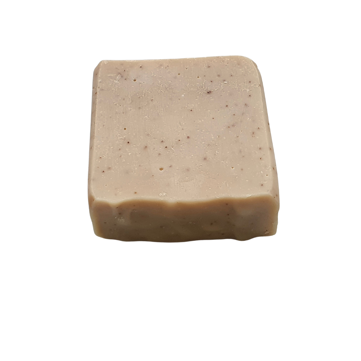 This image shows a close up of the light cream coloured bar. You can see the coffee grind speckles. 